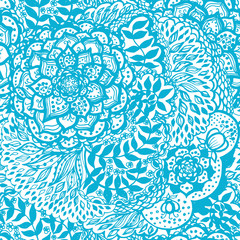 Floral doodle seamless wallpaper pattern. Illustration with paisley ornaments. Textile with hand-drawn flowers.