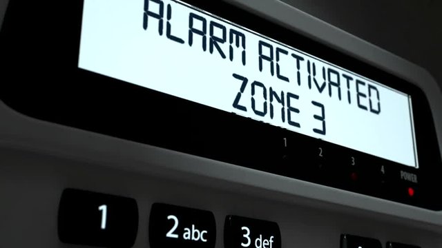 A 3D render of a home security keypad access panel with buttons and an illuminated screen indicating an alarm for an intrusion