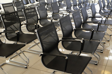 Rows of new chairs in the presentations hall