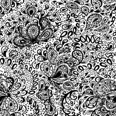 Floral doodle seamless wallpaper pattern. Illustration with paisley ornaments. Textile with hand-drawn flowers. Black and white color.
