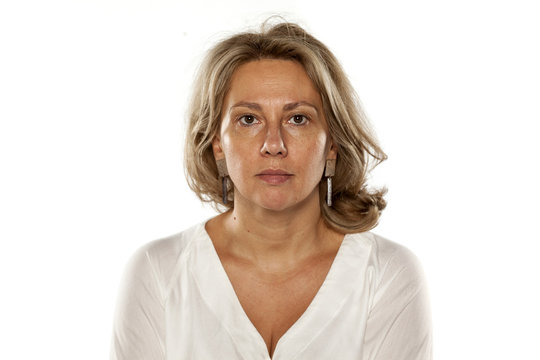 Portrait of beautiful middle-aged woman with no makeup