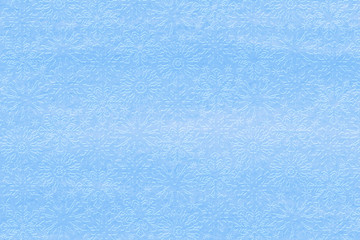 Obraz premium winter background with snowflakes, embossed on light blue paper