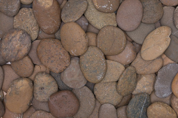 Fototapeta na wymiar Closeup gravel stones for decorative floor.