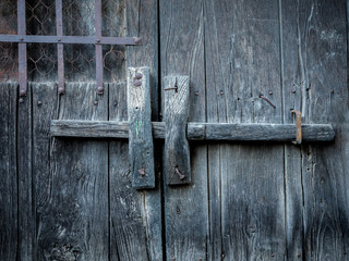 Old wooden black gate background