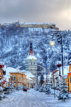 Beautiful view over the citadel and the old city of Rasnov in Christmas winter time, Romania