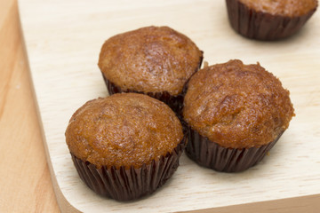banana cake on the wooden board with abstract nature blur background