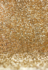 Gold glitter abstract background in perspective view,festive tex