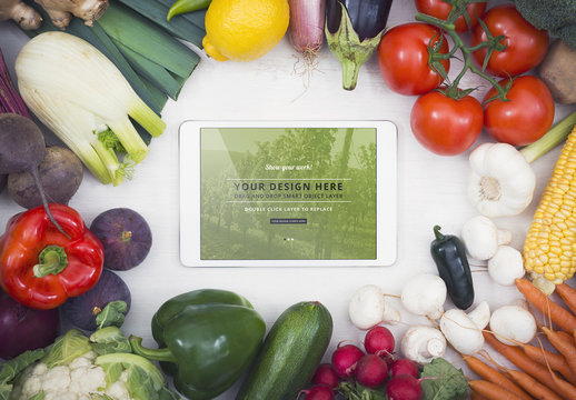 Tablet Surrounded by Vegetables Mockup