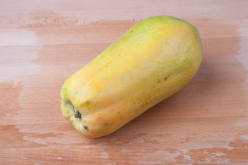 Papaya on wooden table