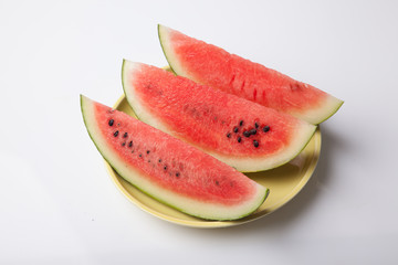 Cut watermelon on dish ready to eat