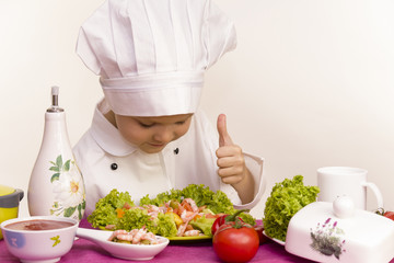 Chef preparing salad with prawns