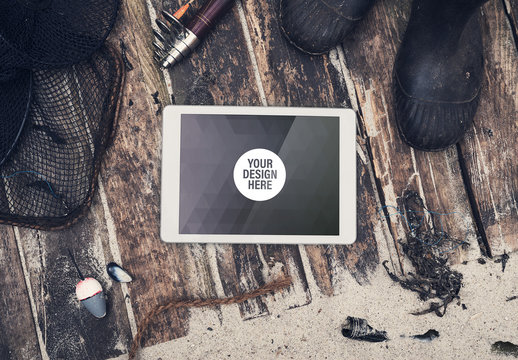Tablet with Scattered Fishing Gear Mockup