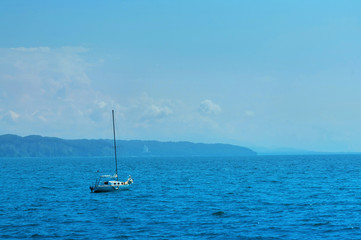 Fototapeta premium lonely yacht in the sea