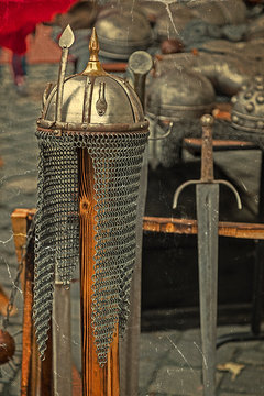 Old postcard with Armor and medieval weapons on display