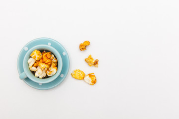 popcorn in cute cup on white backgrounds