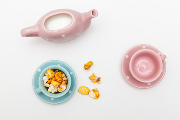 popcorn in cute cup on white backgrounds