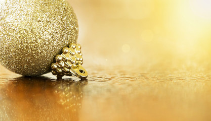 Banner of glittering golden Christmas decoration with copy space