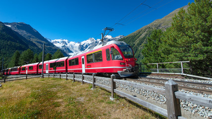 Swiss mountain train Bernina Express crossed Alps © michelangeloop