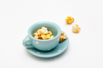 popcorn in cute cup on white backgrounds