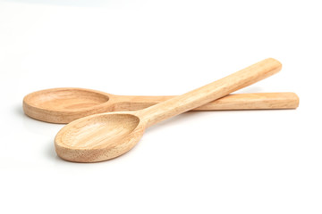 Wooden spoon isolated on a white background