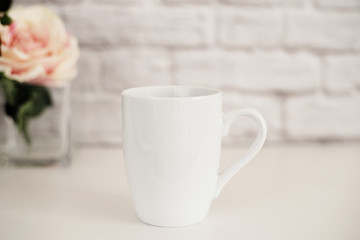Fototapeta na wymiar Mug Mockup. Coffee Cup Template. Coffee Mug Printing Design Template. White Mug Mockup. Blank Mug. Mockup Styled Stock Product Image. Styled Stock Photography White Coffee Cup and Rose Flower