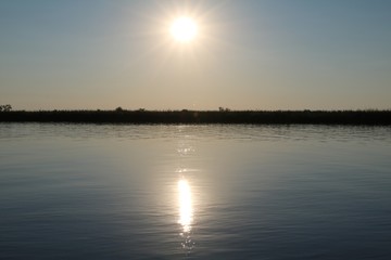 Sun is going under at Cuando of Botswana, Africa 