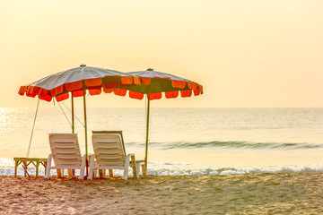 summer vacation, tourism, travel, holidays and people concept, folding chair on beach