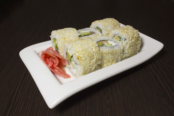 Beautifully decorated sushi on a plate.