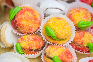 Mix of sweet desserts/ cup - cakes / macaroons