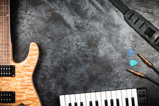 Electric guitar on grey background