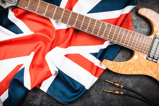 Electric guitar on grey background