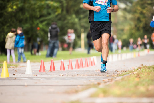 Unrecognizable Runner Outdoors. Long Distance Running.