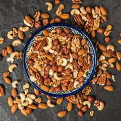 Mix of different nuts closeup photo