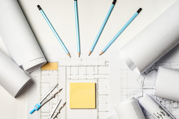 Workplace of architect - rolls and plans.