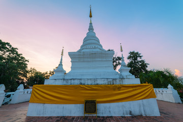 Sunset scence of White pagoda at Wat Phra That Khao Noi, Nan Province, Thailand
