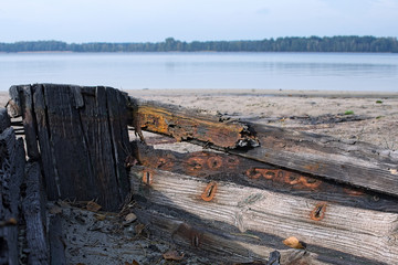 Old abandoned wooden boat. close-up of the nose of the boat