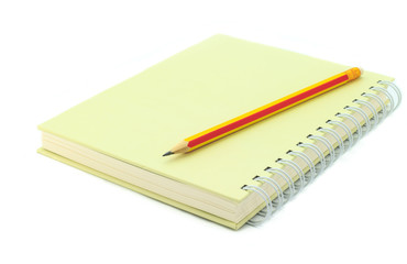 Place the pencil on notebook