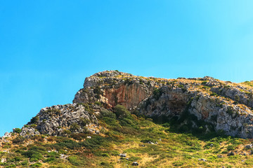 View of scenic mountains landscape with bushes.