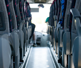 View from inside the bus with passengers.