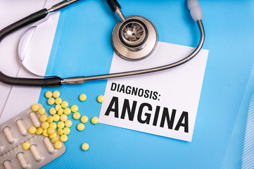 Angina word written on medical blue folder with patient files