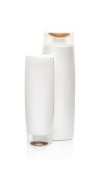 White shampoo bottles isolated on white. Path included
