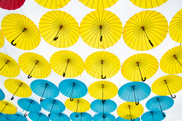 Fototapeta na wymiar different colors umbrellas background