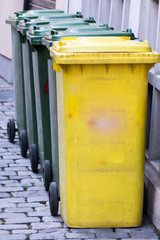 Fototapeta na wymiar Row of garbage cans