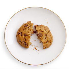 Break oatmeal cookies on a saucer