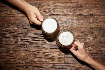 Foto auf Leinwand Hände beim anstoßen mit Bier © Thomas Söllner