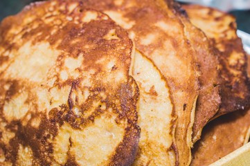 Pile of delicious american pancakes close up