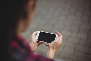Woman using mobile phone