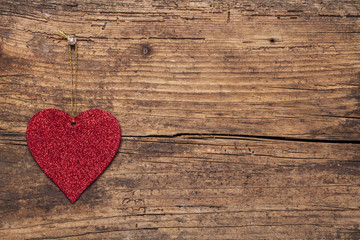 Read heart  on  wooden background.Valentines Day background with hearts.