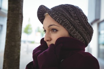 Woman shivering with cold
