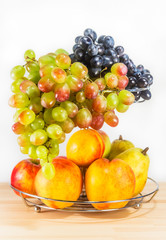 Fototapeta na wymiar Fresh fruits on wooden table